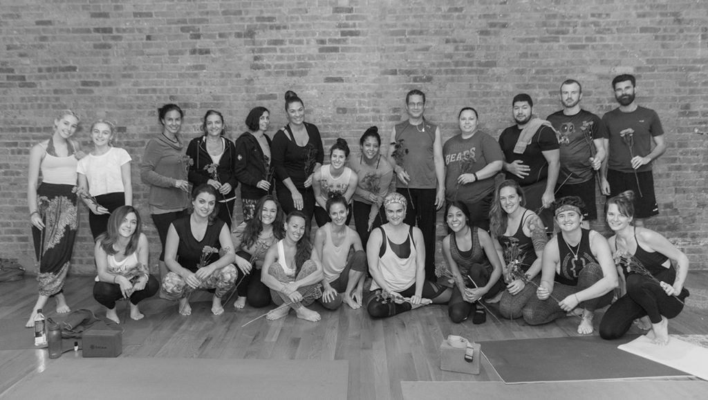 Yoga Workshop and class with Ilona Barnhart in Chicago IL. Brick wall at Loft Yoga Chicago and students